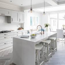 Dark floors, gray walls, white trim. 10 Gorgeous Kitchens With Wood Floors