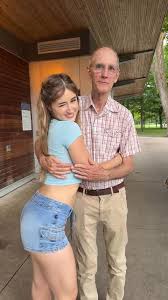 Young influencer faces backlash after dancing next to much older ...