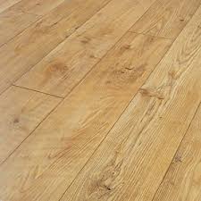 Wooden floors that contrast other wooden surfaces in your kitchen can flesh out your kitchen's colour scheme and atmosphere. Kitchen Flooring Laminate Wood Effect Kitchen Floors