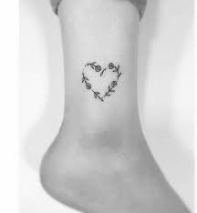 Little flying baby angel tattoo on back. 65 Small Ankle Tattoos Ideas For Girls Tiny Tattoo Inc