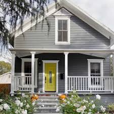 Adding a yellow door to a blue house can create a vivid contrast. Siding Modern Grey House Exterior Color Schemes Novocom Top