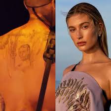 Justin Bieber just hit the stage sporting a brand-new back tattoo and it appears to be Hailey Bieber's face
