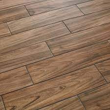 Just the right mix of pretty and practical. Daltile Baker Wood 6 In X 24 In Walnut Glazed Porcelain Floor And Wall Tile 14 55 Sq Ft Case Bk10624hd1pr The Home Depot Porcelain Flooring Daltile Wood Look Tile Floor