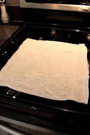 How To Clean Your Glass Cooktop Using Baking Soda And Water Cleaning Hacks Glass Cooktop Household Cleaning Tips