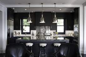 Because they aren't on full display, you don't have to worry if you don't love this charming kitchen blends natural wood, open shelves, and black cabinets for a look that's both modern and timeless. 30 Sophisticated Black Kitchen Cabinets Kitchen Designs With Black Cupboards