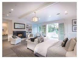 If it is a larger room a small sitting area can be nice with two chairs and a small table. Staging This Room Is Very Important Because It Gives People An Idea Of How To Use The Space It In 2021 Large Bedroom Layout Master Bedroom Layout Dream Master Bedroom