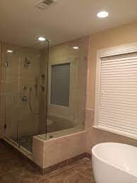 Frameless 90 Degree Corner Shower With Built In Bench Seat Stand Alone Tub Bathroom Remodel Designs Bathroom Inspiration Frameless Shower Enclosures
