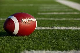 Soccer football field stadium grass line blue sky background. Football Field Construction Cost