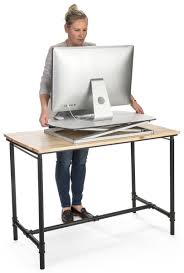 Enter the standing desk converter, a perfect medium between replacing your desk altogether and continuing your sedentary routine. Pin On Home Office