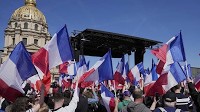 Anti-racism group files complaint over race hate flyers at Le Pen rally in