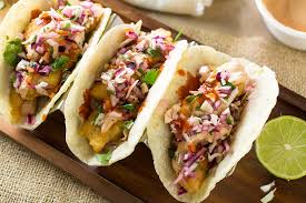 We love all things mexican and seafood around here. Beer Battered Fish Tacos With Spicy Habanero Slaw Chili Pepper Madness