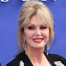 Michelle Keegan just wore a tweed jumpsuit with a bag by Kate Middleton's  favourite designer