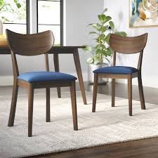 Think wicker or wood to achieve a breezy look, or go the more industrial route with a stylish metal finish. George Oliver Waterbury Solid Wood Dining Chair Reviews Wayfair
