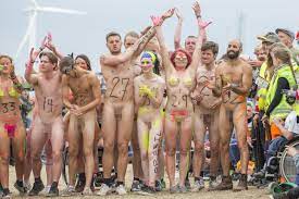 Hundreds of NAKED runners strip off for Denmark's annual Roskilde festival Naked  Race | The Sun