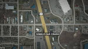 Holland man's car flips multiple times, ends up in drive-thru driveway