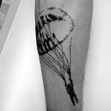 This is really a funny and innovative design in colors of purple, green, black, red, and brown. 30 Parachute Tattoo Designs For Men Sky Diving Ink Ideas