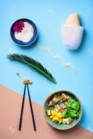 Traditional hawaiian poke may consist of cubed raw fish, maui onions, inamona, limu, soy sauce, green onions, or sesame oil.14. Hawaiian Poke Bowl With Rice Chicken And Salad Microgreens Stock Photo Picture And Royalty Free Image Image 118491015