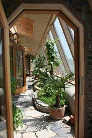 Earthship Tempelhof Small Indoor Gardening An Example Of Small Scale Vegetable Cultivation Are Several Rows Of Plant In 2020 Earthship Home Earthship Earth Homes