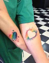 60 Best Matching Tattoos Meanings Ideas And Designs Rainbow Tattoos Friend Tattoos Cute Couple Tattoos