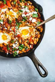 10 Easy Vegetarian Recipes To Make For Dinner Society19 Uk Shakshuka Shakshuka Recipes Healthy Eating Recipes
