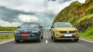 Vergleichen sie volkswagen tiguan motoren, ausstattungen und rabatte vor dem autokauf.sie können sich die alternativen ansehen oder einfach ihr auto konfigurieren und stressfrei angebote mit carwow vergleichen. Exclusive Comparison Test 2020 Skoda Karoq Vs Vw T Roc Overdrive