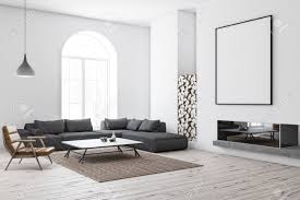 Rugs, yes, but i would tend to let the drama of the dark floor come out and run right up to white upholstered furniture without covering that beautif. Corner Of Modern Living Room With White Walls Wooden Floor Stock Photo Picture And Royalty Free Image Image 111681930