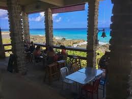 Two floors that include 1.5 bathrooms, a living room, dining area, small kitchenette and a bedroom with a king size bed. A Sweet Little Oasis In The Middle Of Paradise Review Of Vivo West Bay Cayman Islands Tripadvisor