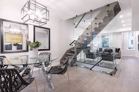 And nothing to do with smell but how're you gonna walk to get a bowl of cereal without your pants on and the neighbors not seeing from your living room windows. A Living Room And Dining Room Became Open Concept By Opening Up The Stairs In Toronto Canada 2648x1762 Roomporn