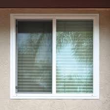 Simonton 96 In X 48 In Daylightmax Left Hand Sliding Vinyl Window White Dmsl 9648whl2arhs The Home Depot Sliding Vinyl Windows Window Vinyl Slider Window