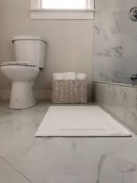 Whether you're designing a new bathroom or updating the style of an existing one, accents like plants, rugs, stylish storage and towels can refresh your bathroom no matter your budget. Choosing Affordable Flooring Tile For Our Waco Bathroom Remodel My 100 Year Old Home