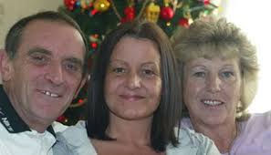 Family's joy as battered wife is finally home