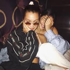 Kendall jenner took charge and at one point during their beach day climbed on top of bella hadid. Bella Hadid And Kendall Jenner Take London Grazia