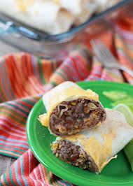 Roll Up A Few Of These Easy Refried Bean Burritos Bake Em Up And Eat Them Now Or Freeze Individually For Super Easy Lu Recipes Vegetarian Recipes Vegetarian
