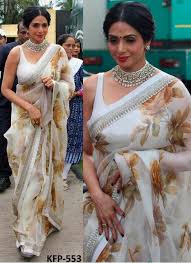 Sridevi Georgette Print Off White Replica Saree Saree Floral Floral Print Sarees Indian Wedding Outfits Actress sridevi at delhi couture week wearing a white netted saree designed by sabyasachi mukherjee. saree floral