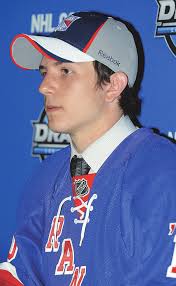 Sombre crowd greets soldiers