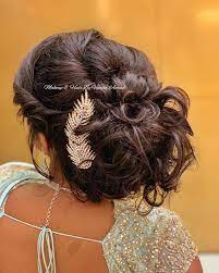Gorgeous Romantic Messy Bun Hairstyle Bridal Reception Hairstyle By Mua Vejetha Anand For Swank Messy Bun Hairstyles Indian Bridal Hairstyles Bridal Hair Buns