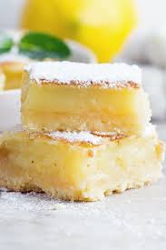 In a blender, combine all of the ingredients and pulse for 10 seconds. Lemon Square Bars Dessert Recipe With Flour Sugar Butter Eggs Baking Powder Flour And Lemon Juice Lemonbars Kitchme Recipes Desserts Lemon Square Bars