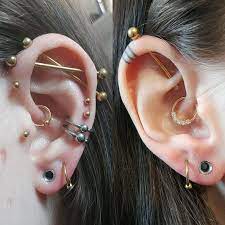 Been Lurking For Years But Today I Stretched To Tunnels For The First Time And I Felt Like Sharing My Current Projects P Bow Earrings Ear Piercings Piercings