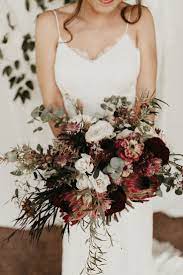 Check spelling or type a new query. Organic Textured Bouquet With Deep Wine Tones And Soft Eucalyptus Bridal Bouquet Fall Moody Wedding Flowers Affordable Wedding Flowers