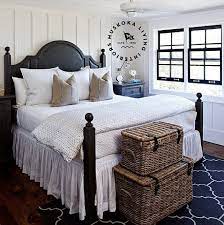 Casual Coastal Bedroom With Board And Batten Walls Muskoka Living Interiors Coastal Bedroom Cottage Bedroom Coastal Bedrooms