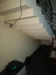 Traditional styling for under stairs storage unit. Tv Unit Under The Staircase