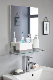 This simple shelf lets you cross two things off your bathroom wish list: Glamour Square Bathroom Mirror Shelf Studio