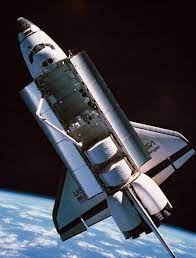Since the early days of the rocket engine in the first half of the 20th century. The Space Shuttle With Cargo Bay Open Orbiting Above Earth Stockbyte Jpg 684 900 Space Shuttle Space Shuttle Challenger Space Flight