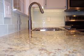 white glass subway tile kitchen