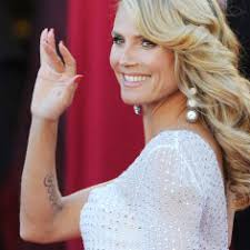 Over one year after filing for divorce from seal after seven years together, heidi klum is. Heidi Klum Seal Tattoo Soll Weg Womenweb De