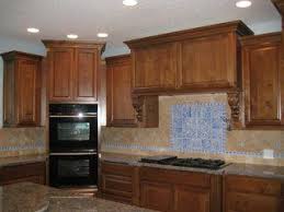 Easily Upgrade Existing Cabinets By Varying Heights And Adding Crown Moulding Double Oven Kitchen Kitchen Corner Kitchen