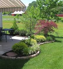 Curved Landscape Border Fill In With Dwarf Shrubs Ground Cover Steeping Stones And Mulch R Landscaping Around Patio Patio Landscaping Backyard Garden Design