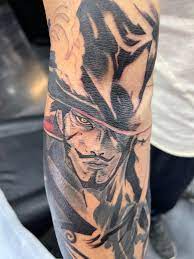 Mihawk tattoo done in my shop today. Had a nice long chat with a fellow fan  about the state of things in OP. Not finished yet : r/OnePiece
