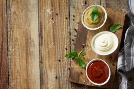 Leave the mayonnaise as is for a few days, and it will release oils and proteins that. Set Of Sauces Ketchup Mayonnaise And Mustard Sauce On A Wooden Stock Photo Picture And Royalty Free Image Image 112852437
