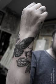 This butter flower is a good option for butterfly tattoos on the back. 60 Best Butterfly Tattoos Meanings Ideas And Designs 2021